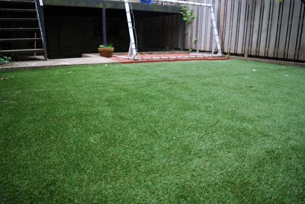 Don't rule out DIY fake turf to transform your yard—even if you're a NYC renter