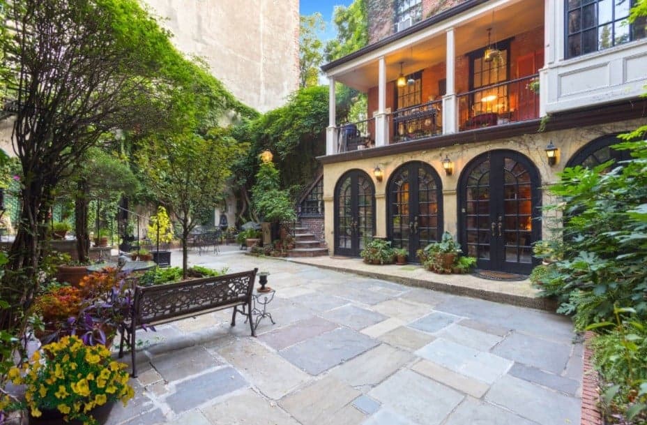 This $449,000 Hell's Kitchen studio comes with access to a gorgeous, New Orleans-esque courtyard