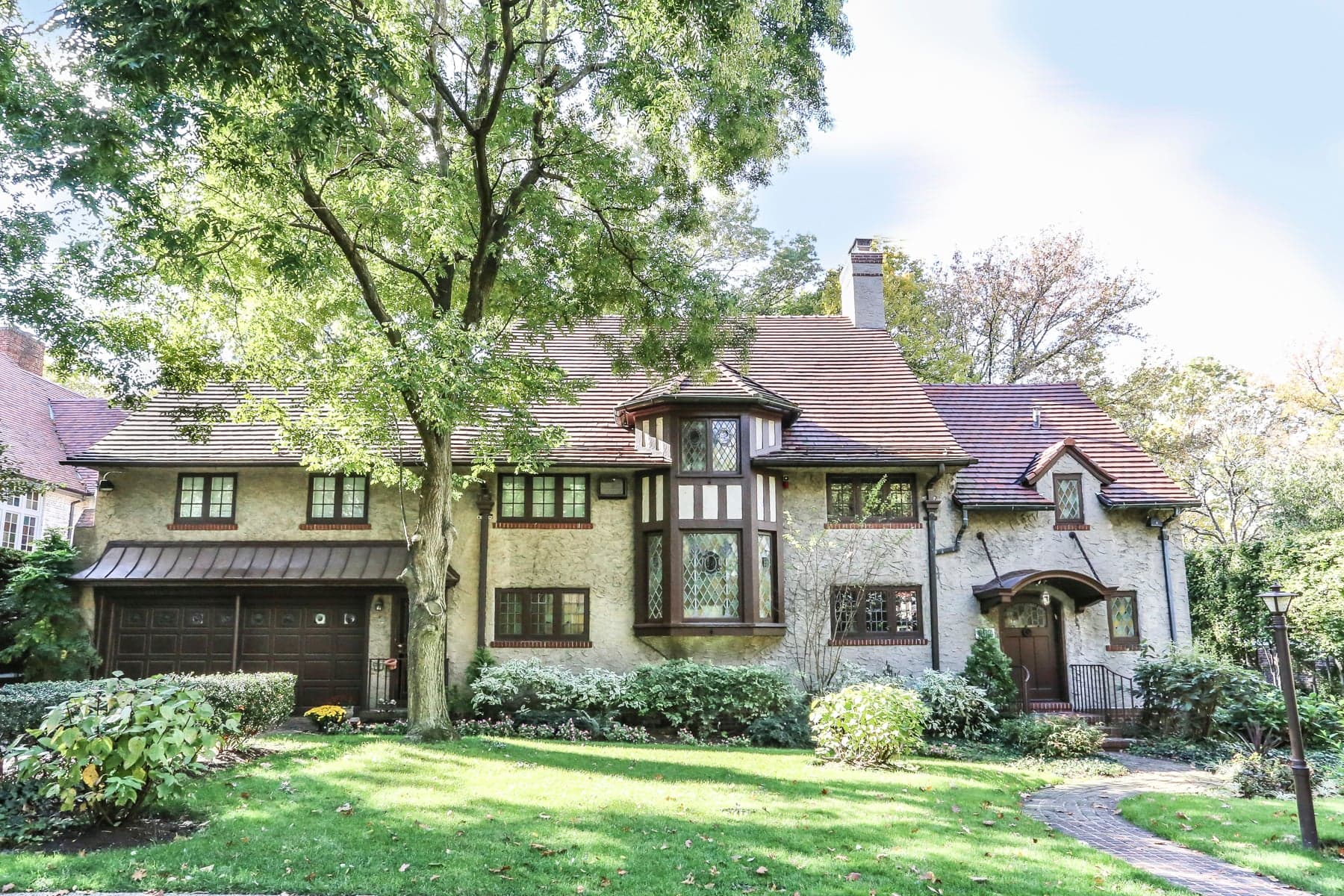 This Forest Hills mansion comes with access to a private park