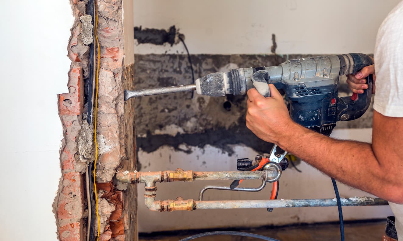 How do I get access to my neighbor's condo to do repairs?