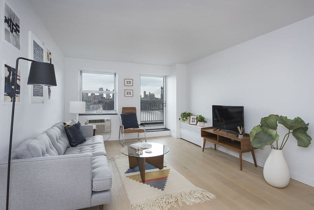 This LES two-bedroom rental comes with a balcony and swanky amenities