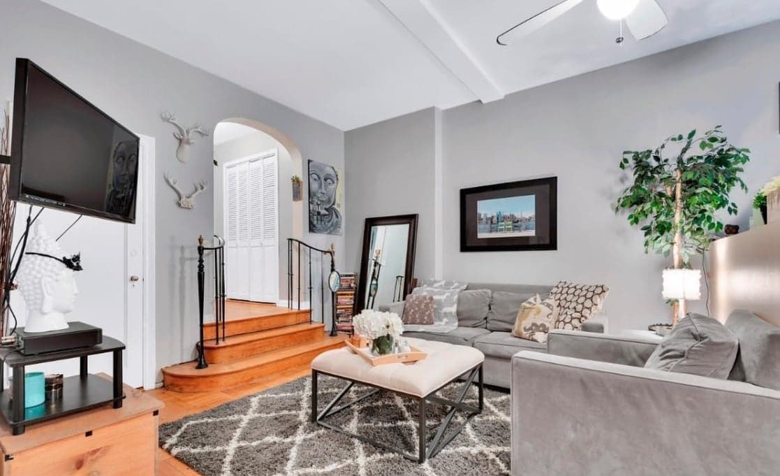 This Upper East Side studio has a sunken living area and a windowed bathroom and kitchen