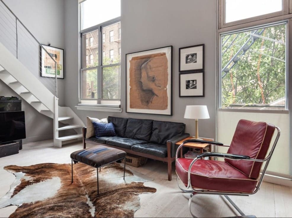 This Williamsburg studio has 14-foot ceilings and a sleeping loft