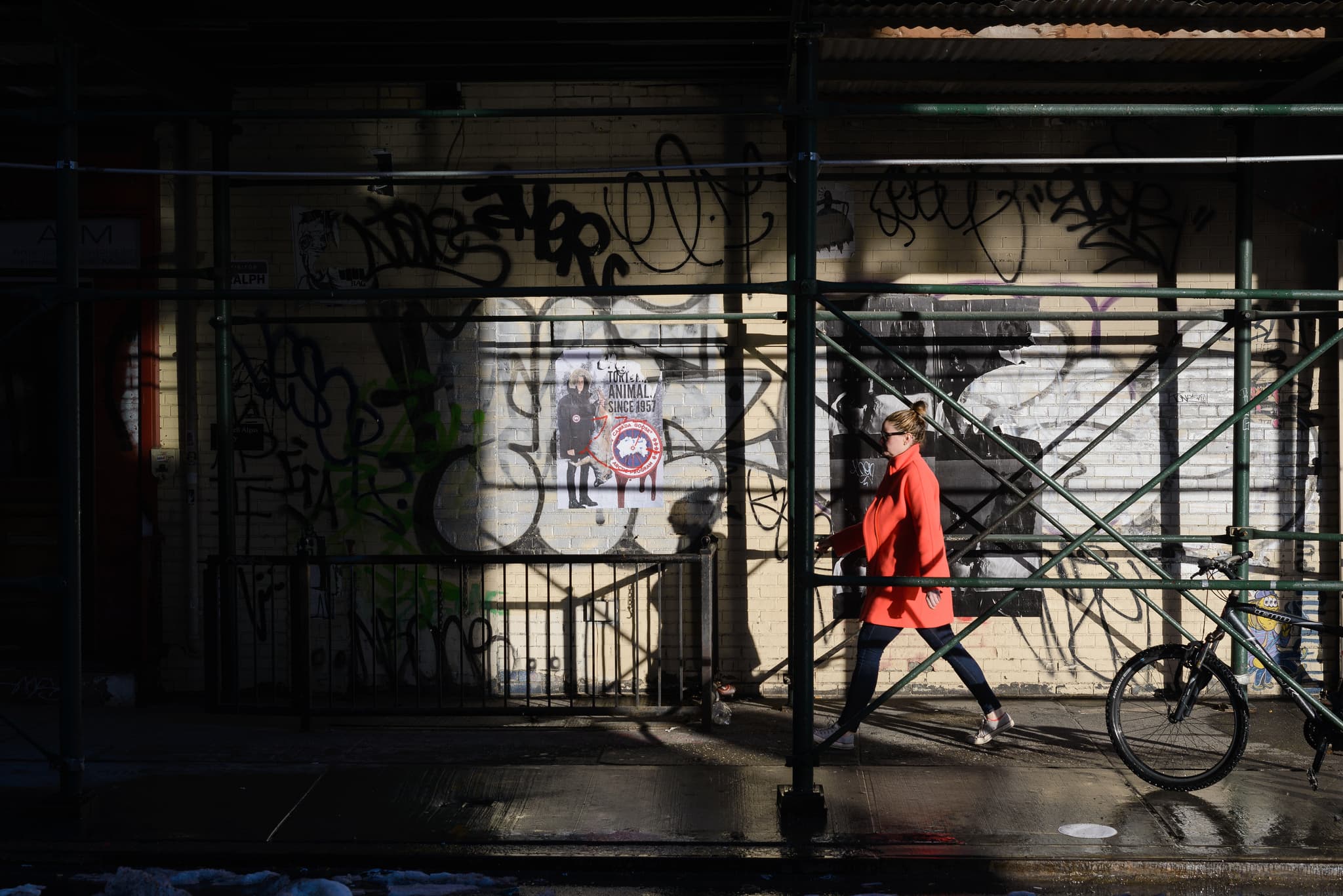 Does my building have to pay the neighbors for the sidewalk shed that extends in front of their building?
