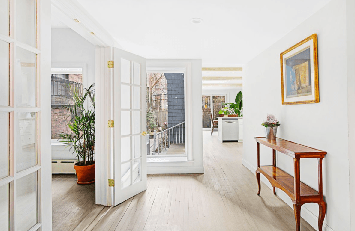 This charming Clinton Hill townhouse has a mansard roof, central air, and room for the in-laws