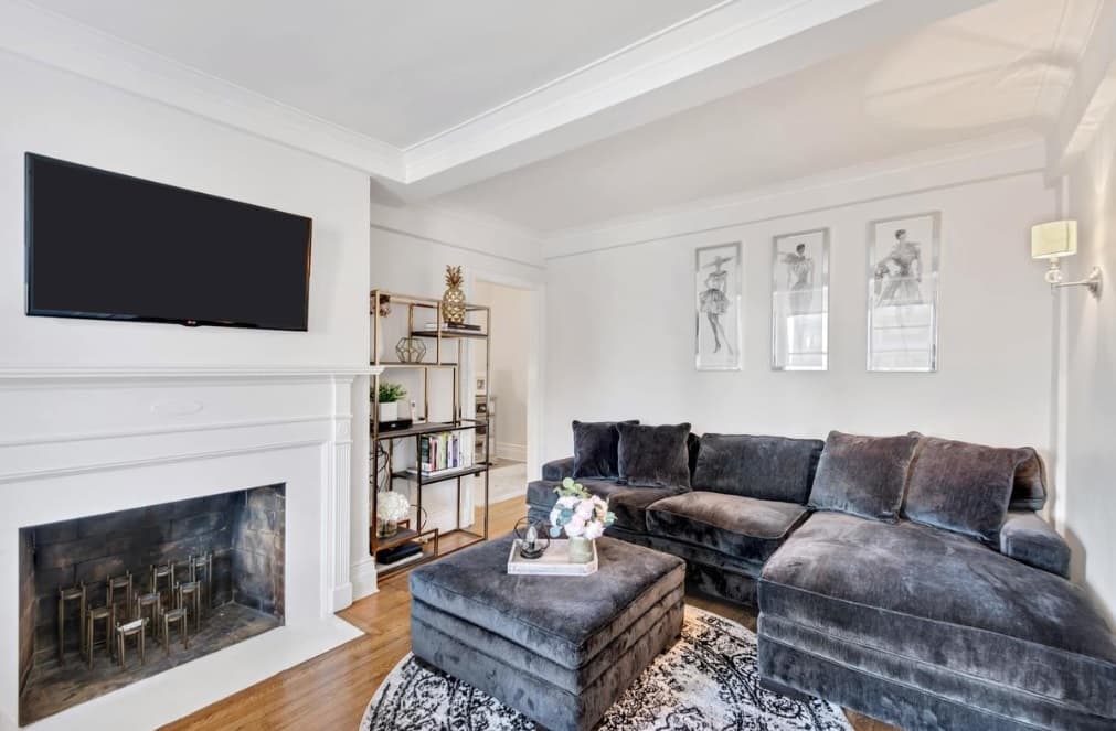 This studio apartment in Midtown has a working fireplace