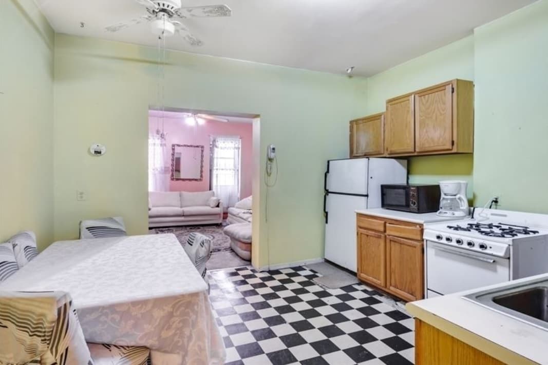 The hellish kitchen in this Hell's Kitchen apartment needs a miraculous makeover