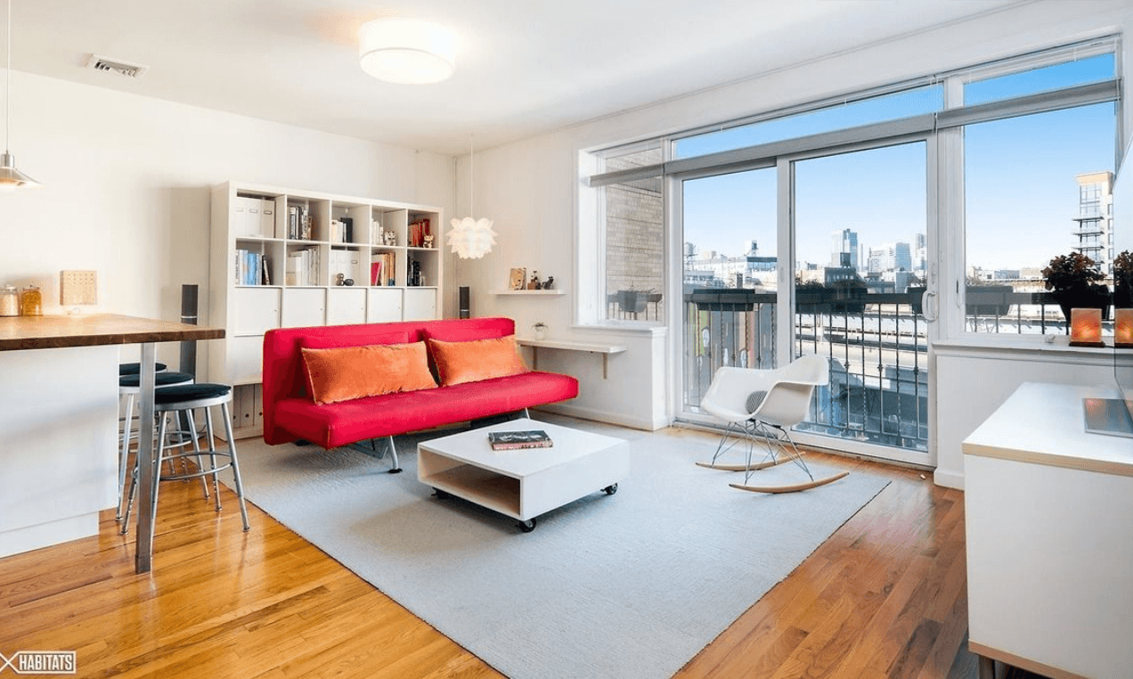 Look out at Williamsburg from this two-bedroom condo with multiple outdoor spaces