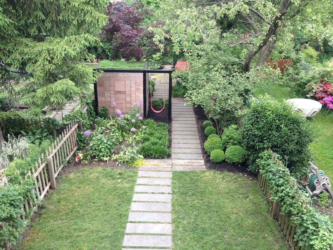 This renovated Park Slope townhouse has a climbing wall and a huge garden