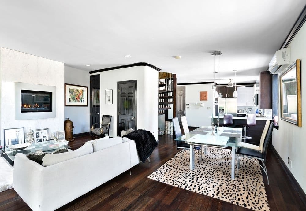 This Astoria duplex comes with a roof deck, balcony, and heated parking