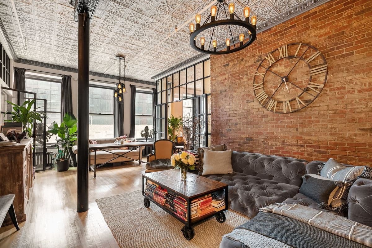 A Chelsea loft for your fantasies about soaring tin ceilings and exposed brick