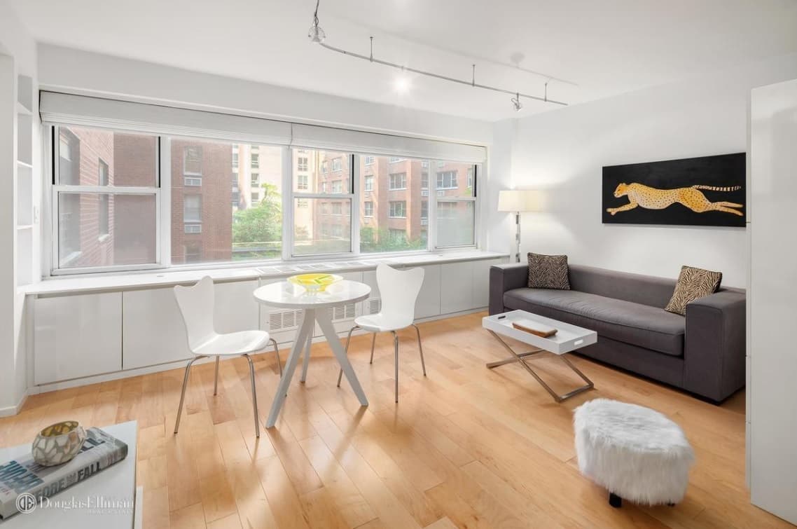 A Sutton Place studio with a storage wall and an office nook, for $535,000