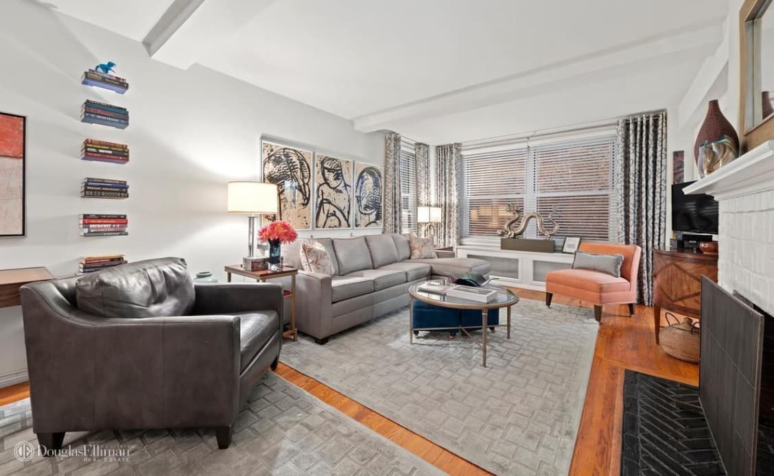 An UES studio with a fireplace, Murphy bed, and walk-in closet, for $495,000