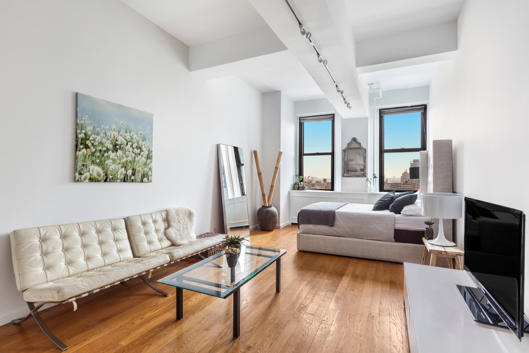 A Chelsea studio has high ceilings, good closets, and washer/dryer approval, for $699,000