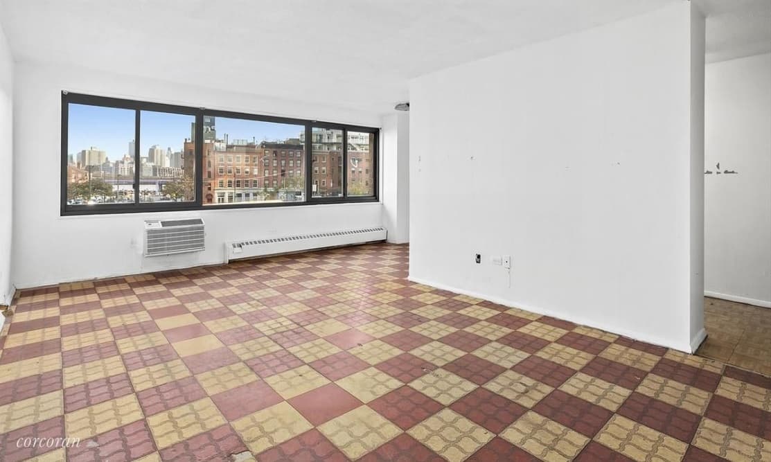 Steal space from the hall to get a bigger bath in this Fidi fixer-upper