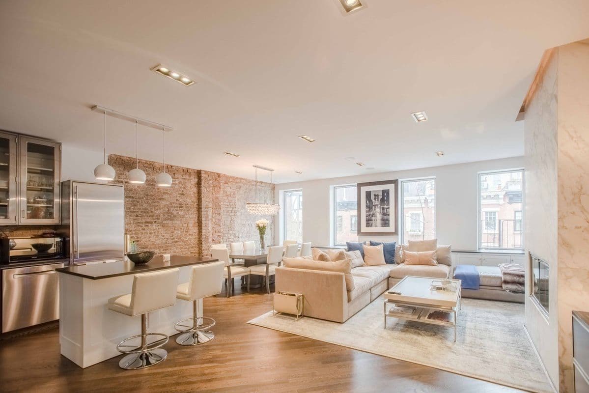 Moving into this furnished West Village duplex would be a breeze