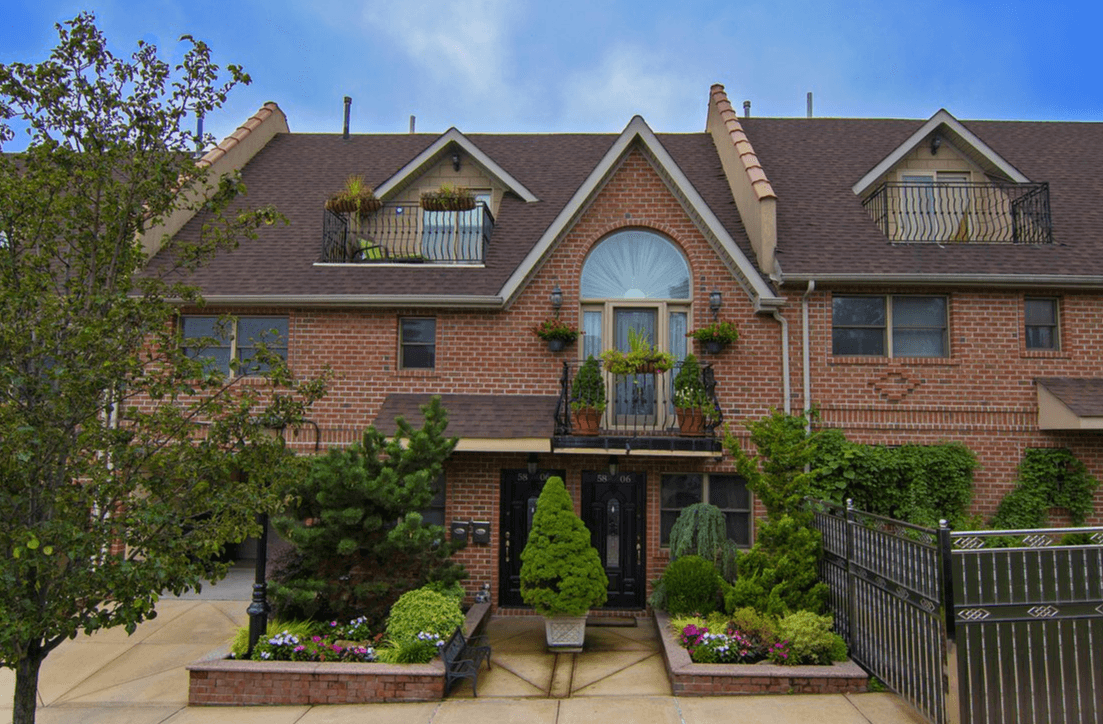 This Middle Village townhouse has a rental, outdoor spaces, and a garage