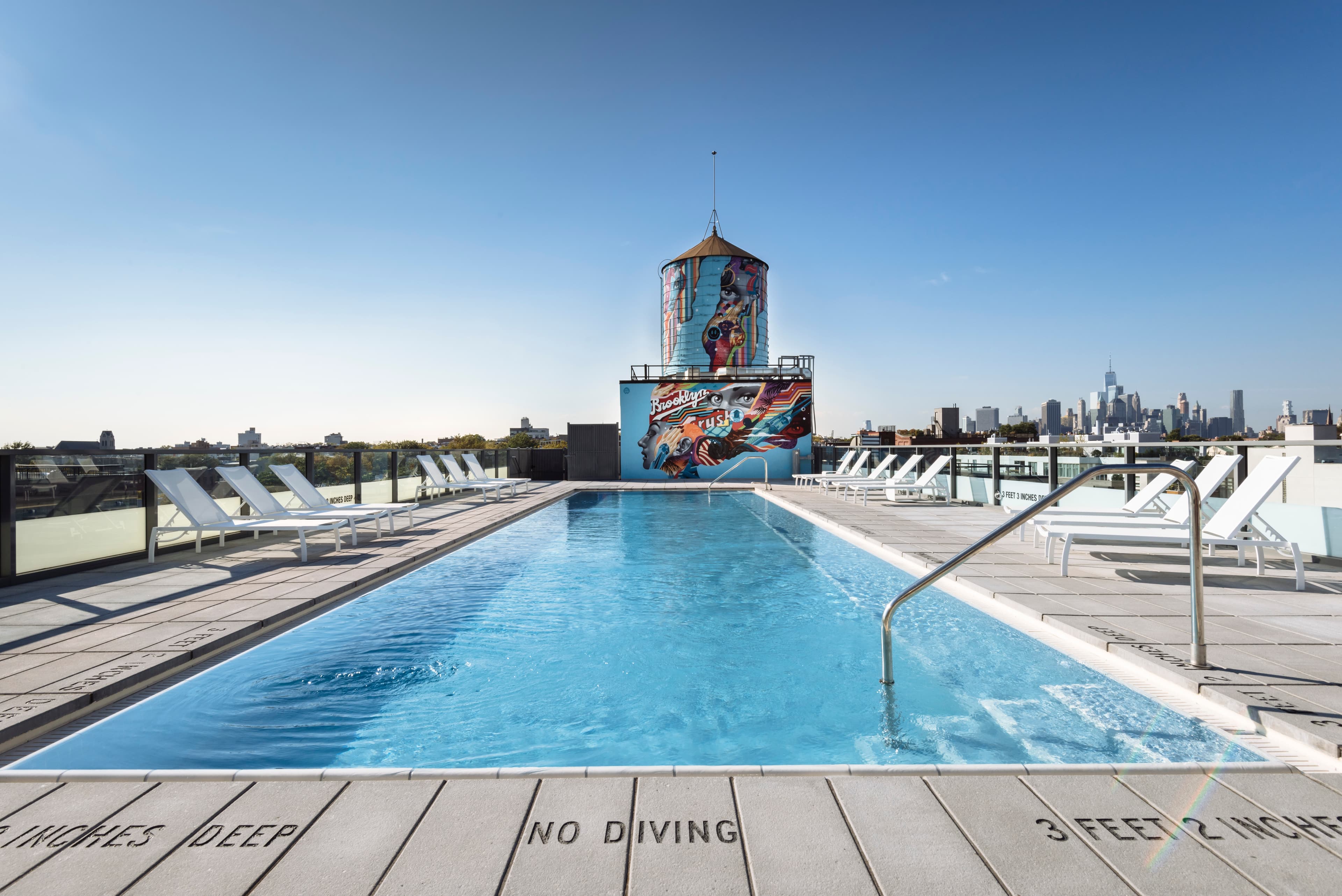 These NYC buildings have 'hidden' amenities including wine tastings, poolside barbecues, and astronomy hours