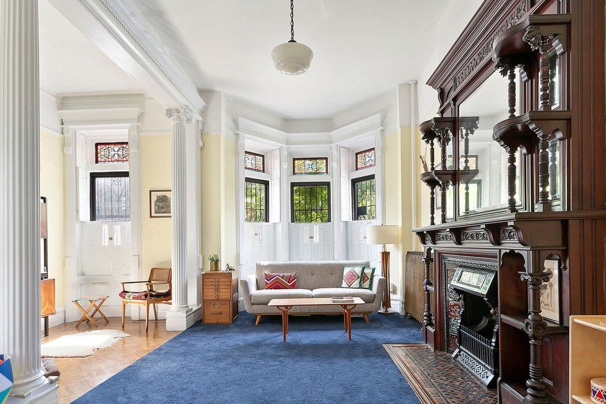 A 1899 Greenwood townhouse with ornate details and a rental apartment, for $1,900,000