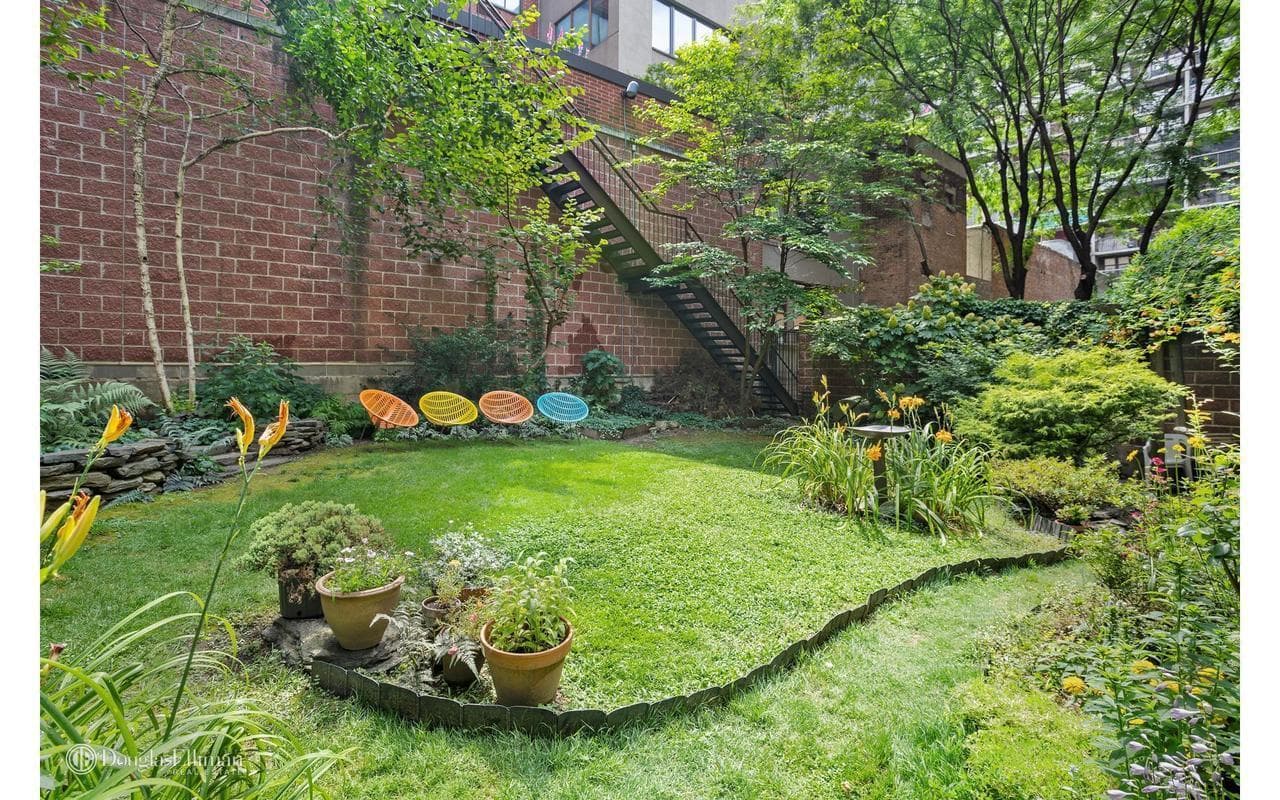 A Hell's Kitchen one bedroom with shared outdoor space for $425,000—if you don't earn too much money