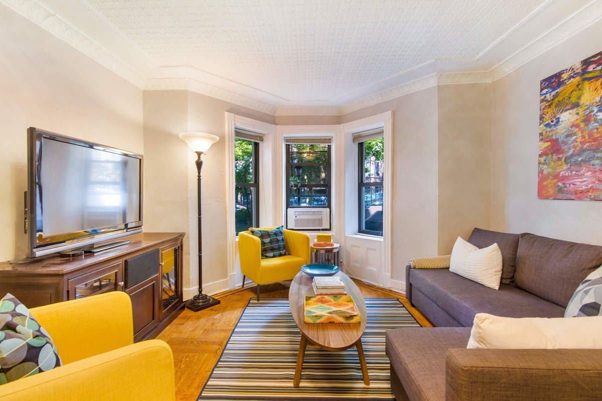 A Sunset Park two family with a grand stoop and a rental, for $1,599,000