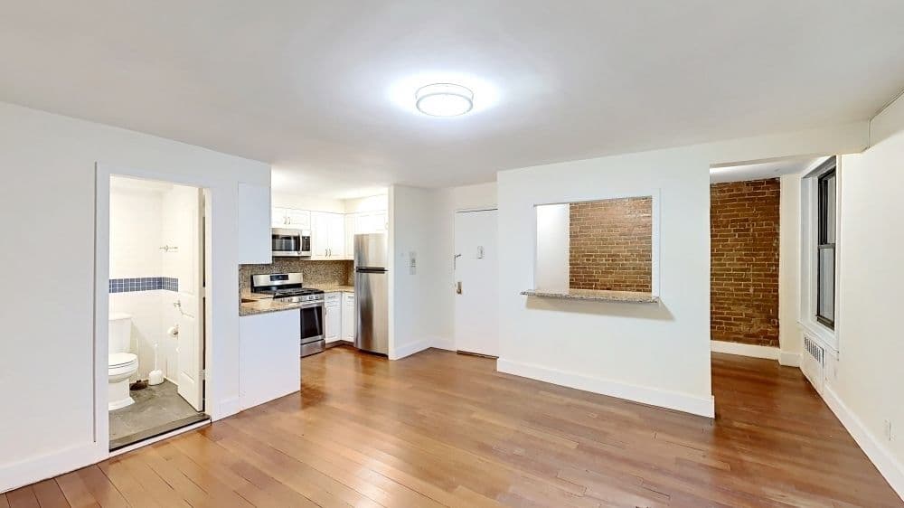 A Brooklyn Heights one bedroom with a private backyard for $735,000, no board approval required 