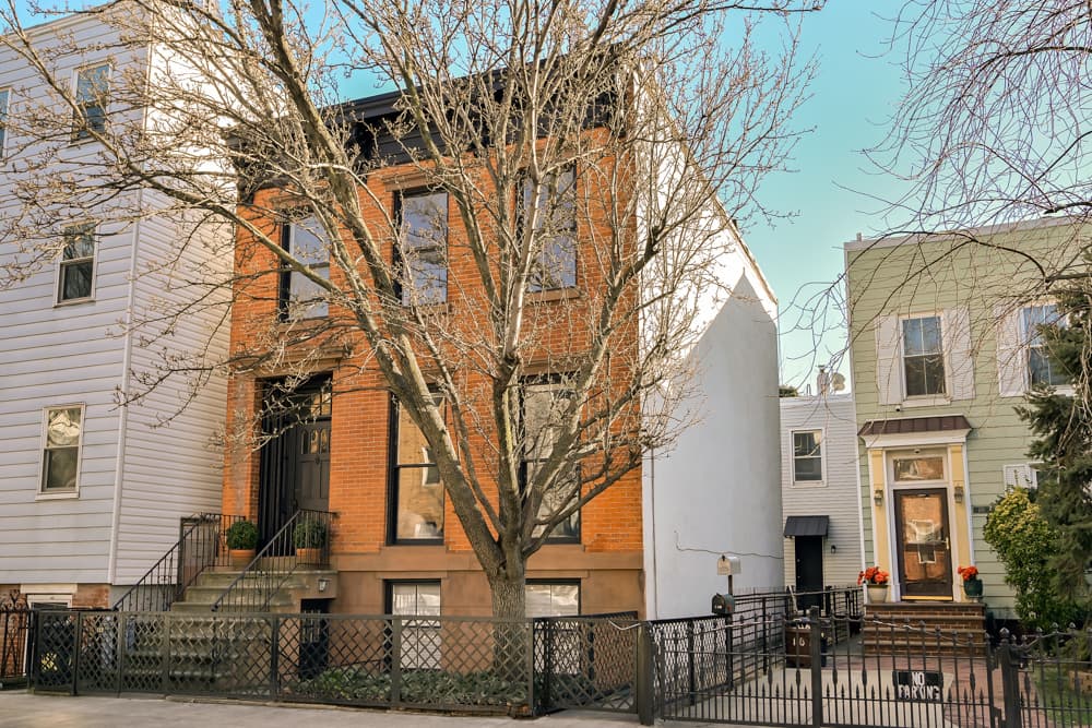 A Greenpoint two-family townhouse—with another house tucked in the back, for $2,800,000