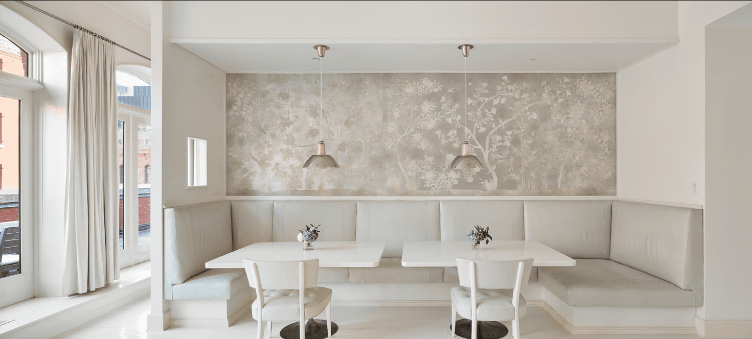 A home with a dining banquette at which to chow and chat with family and friends