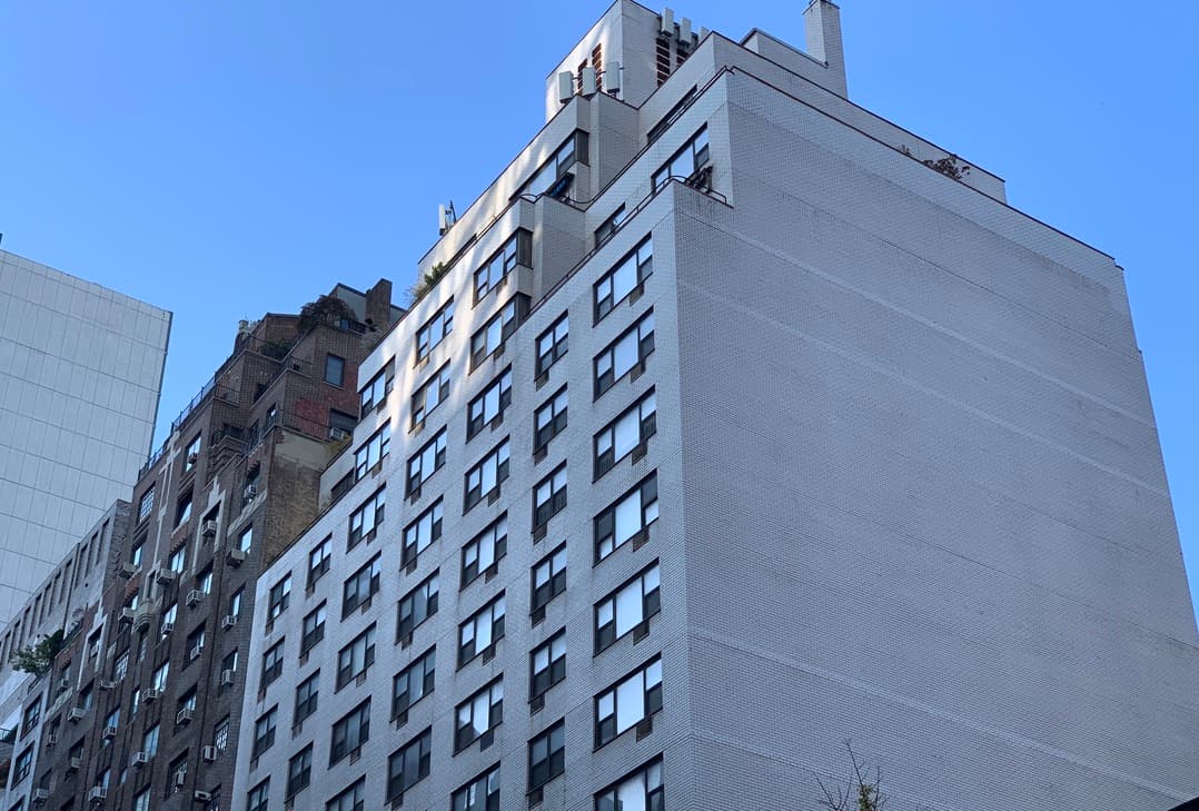 What is the difference between a co-op offering plan and a proprietary lease?