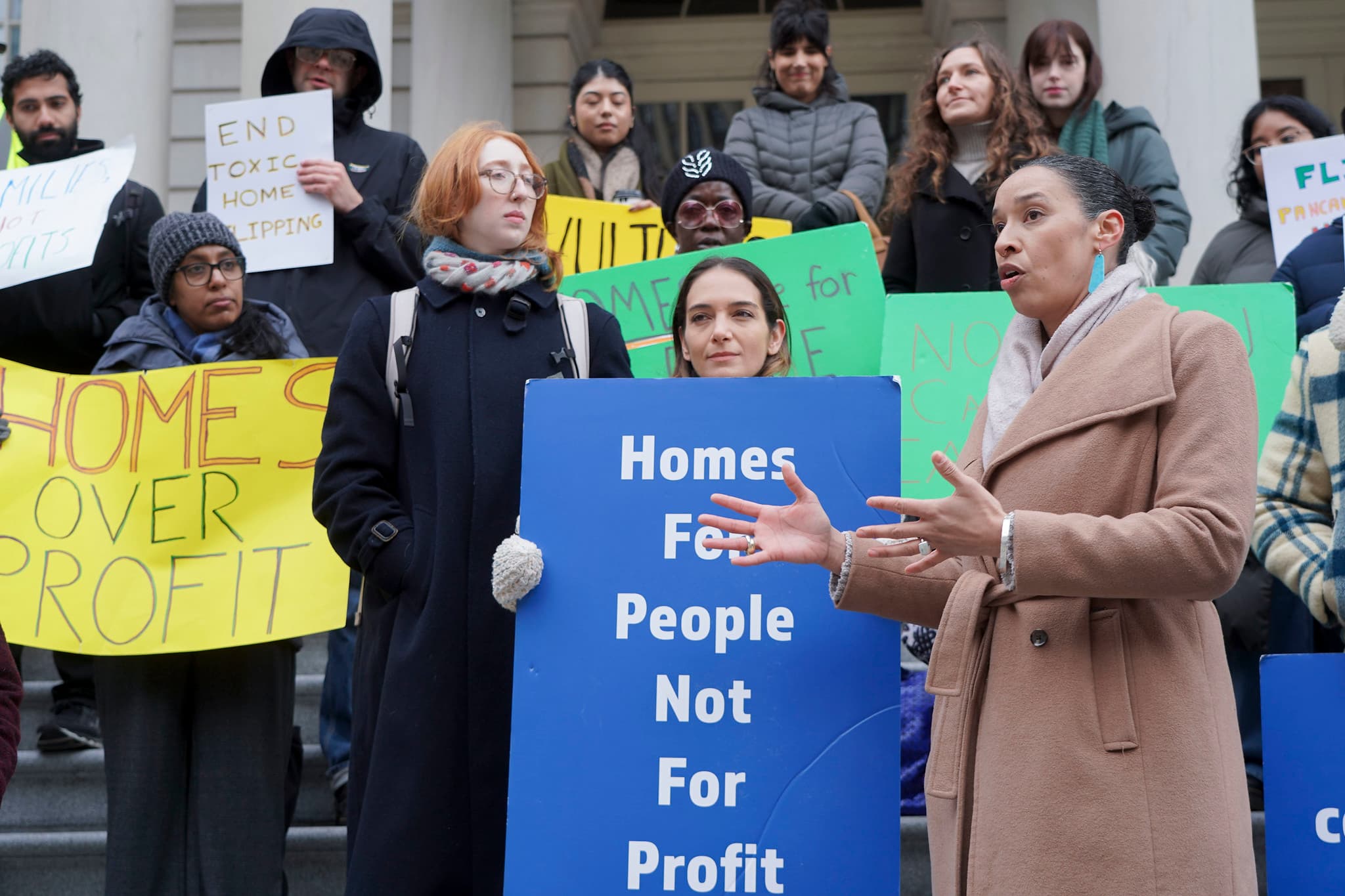 A rally in support of the End Toxic Flipping Act at City Hall