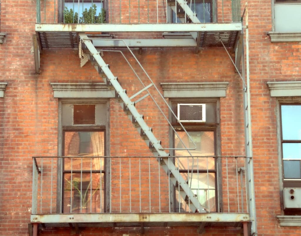 Summertime PSA: If your only window is attached to a fire escape, you'll have to get creative with your air-conditioning