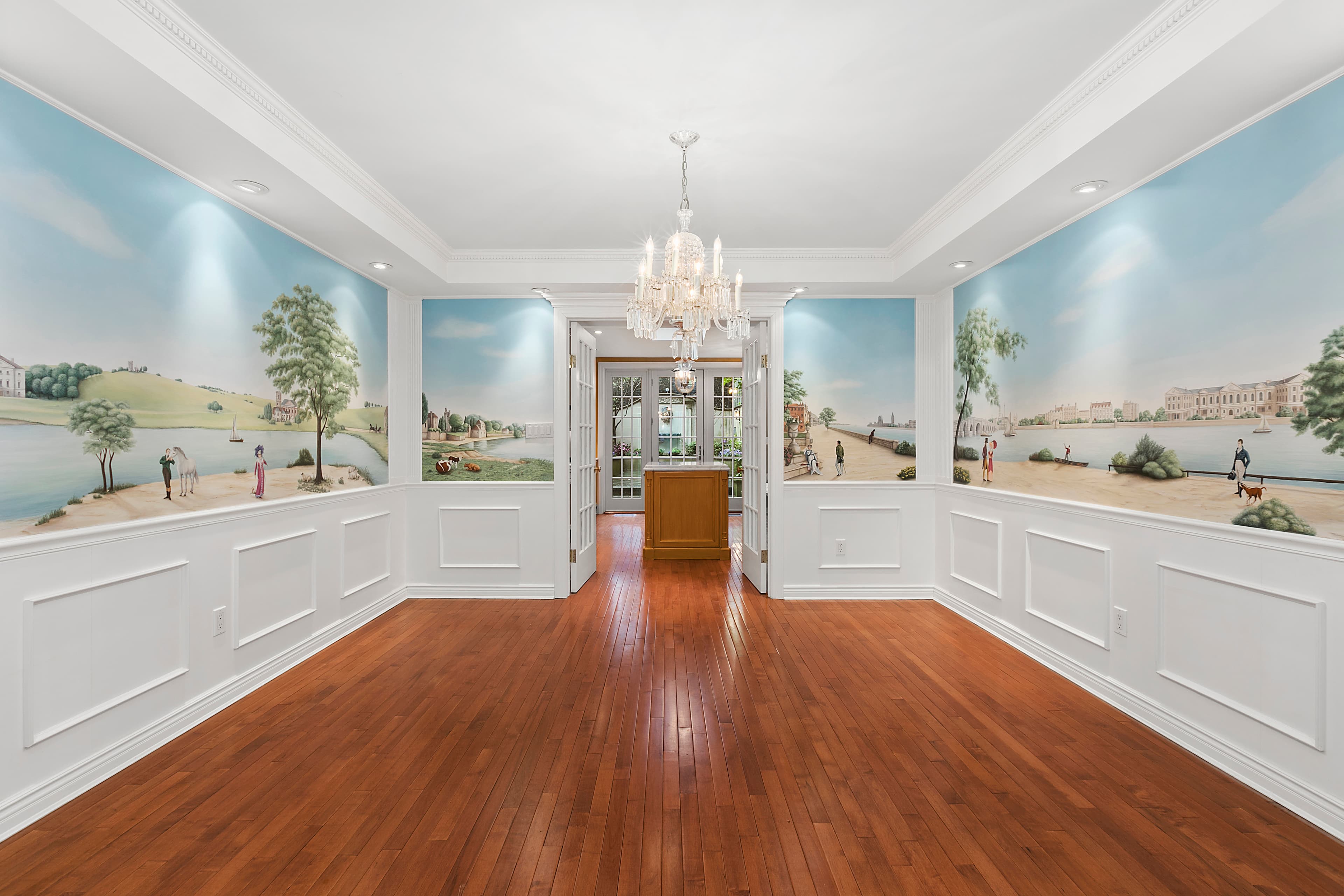 A room with a mural to transport you from the city