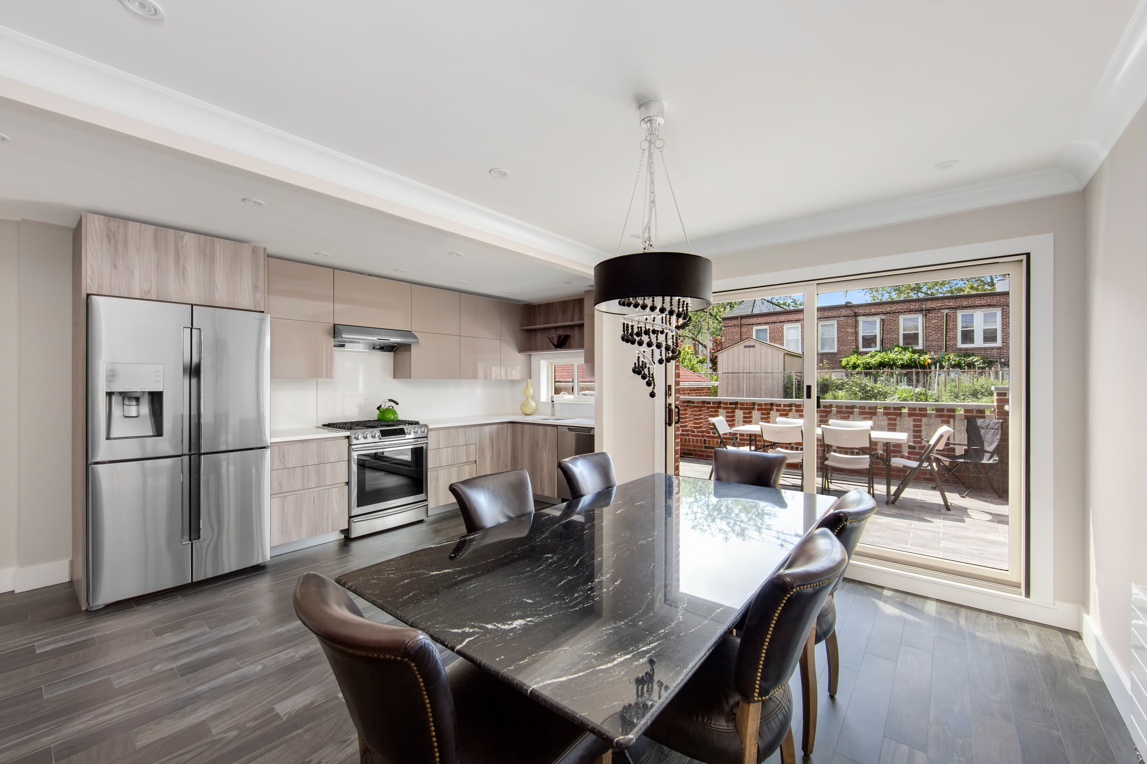 Will this freshly renovated Astoria townhouse get you to pack up and move to Queens?