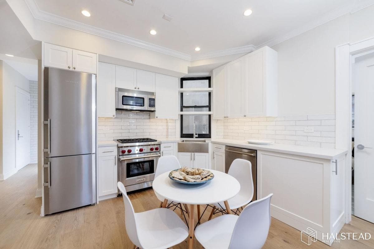 A compact three bedroom in Soho priced way below the median at $1,749,000 