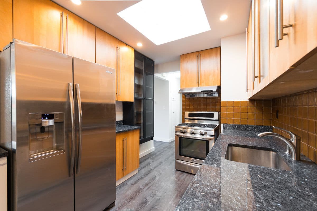 An East Elmhurst two bedroom with two porches and a garage, for $2,800