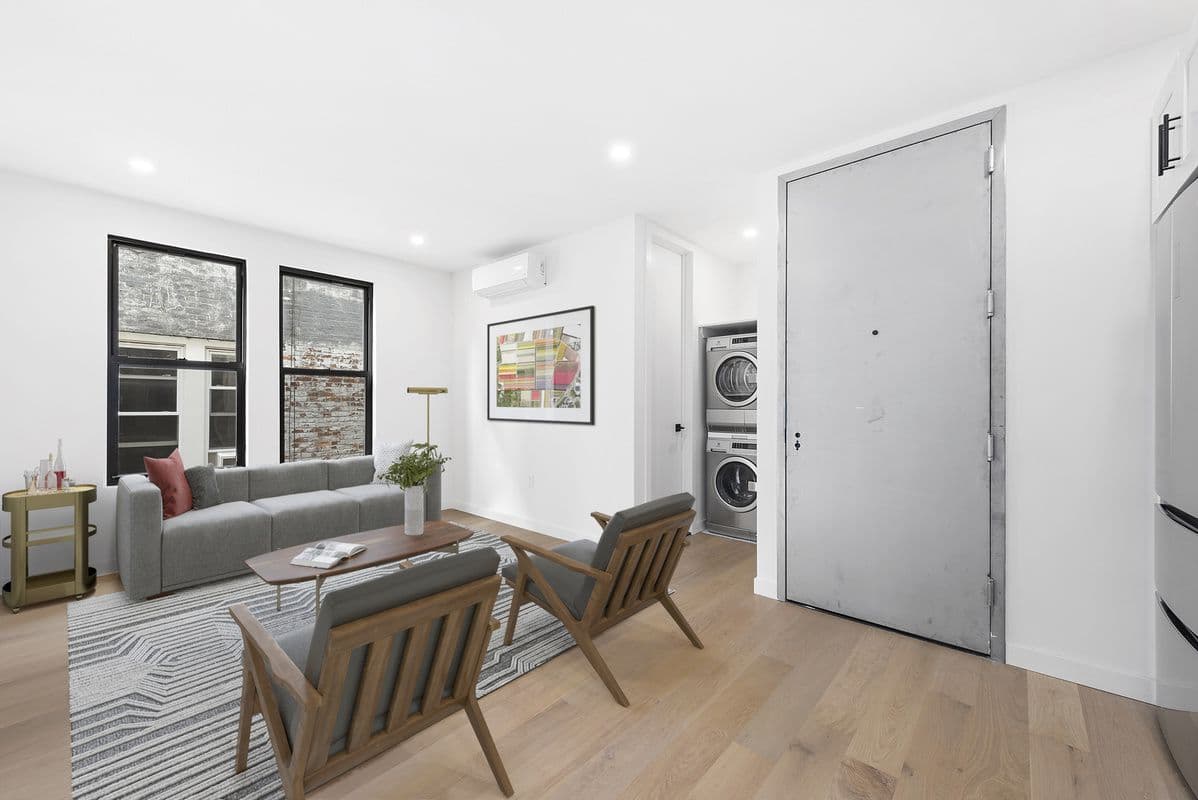 A two bedroom in Sunnyside with a washer/dryer and central air, for $3,000