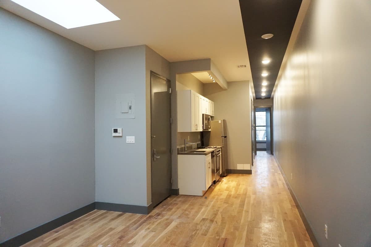 Should you grab two friends and move into this Ridgewood three-bedroom ASAP?