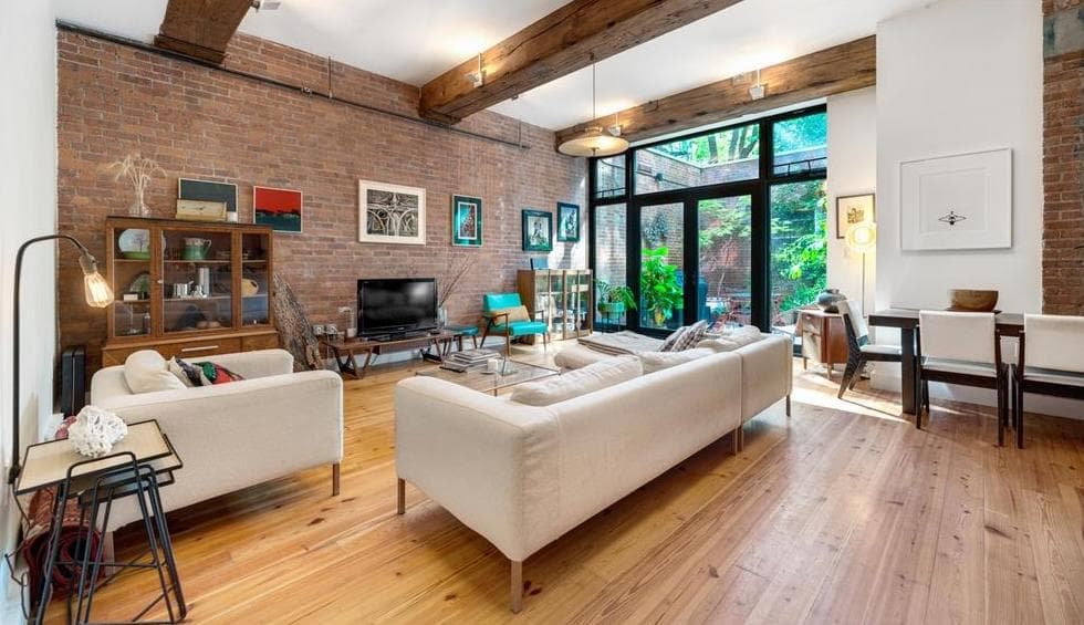 A one-bedroom loft in Williamsburg with an office and private garden, for $6,250