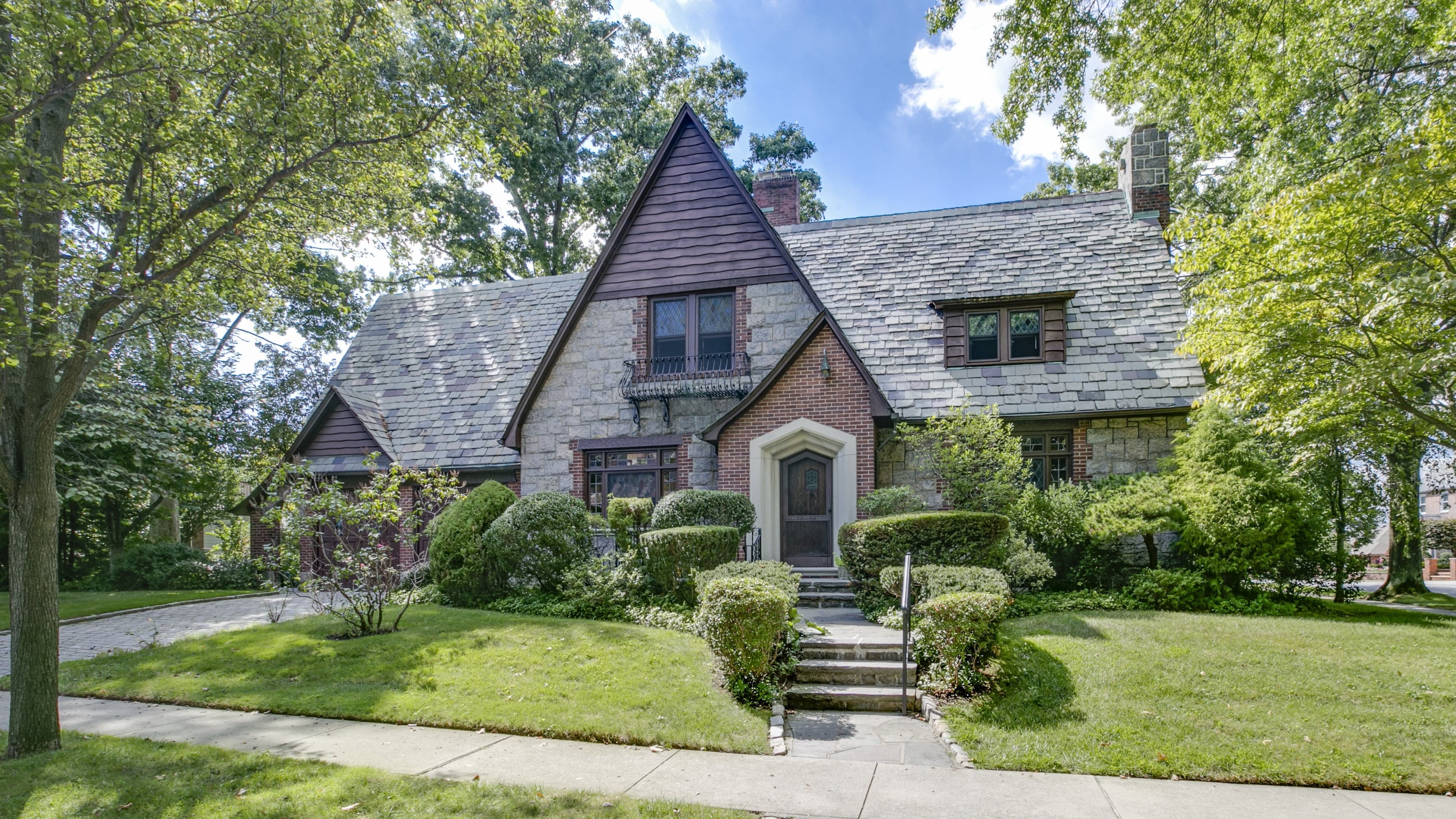 Live like Medieval royalty in this Tudor-style Queens townhouse