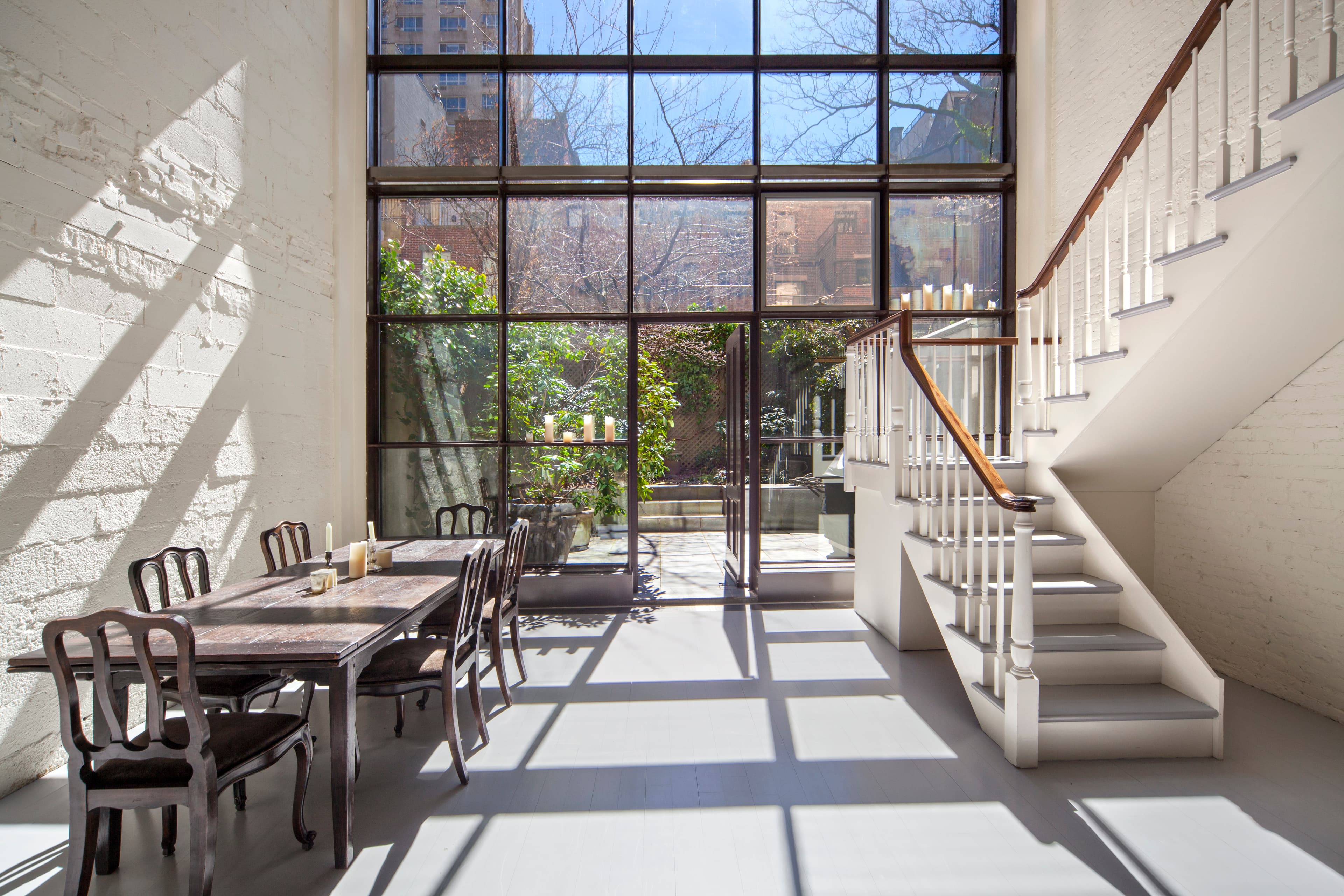 A dramatic wall of windows lights up this 19th-century Upper West Side brownstone