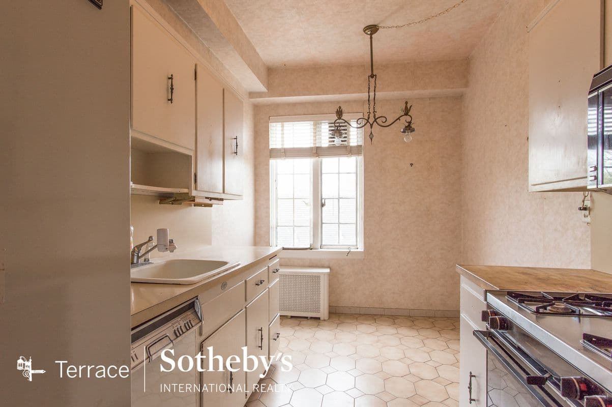 A spacious Forest Hills three bedroom in need of upgrades, no board approval required