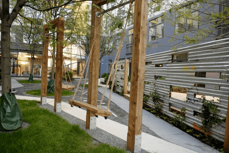 Bocce ball, Saturday cartoons and adult swings: Castle Braid renters size up Bushwick's luxe artist collective