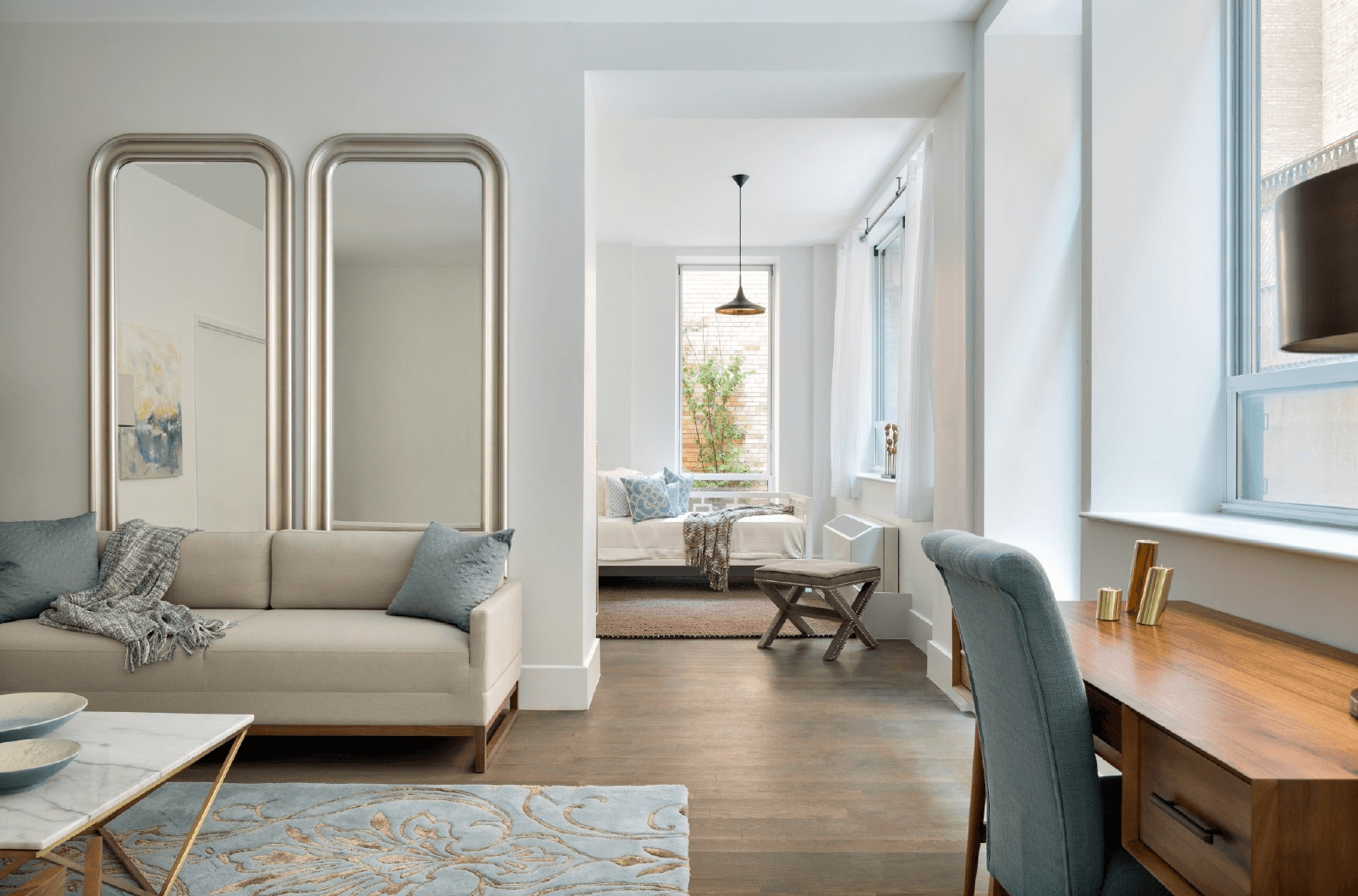 Hide the flatscreen, go tall, and other tips from a staging expert