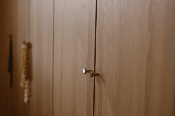 Can I combine my two condos by putting a doorway in the closet?