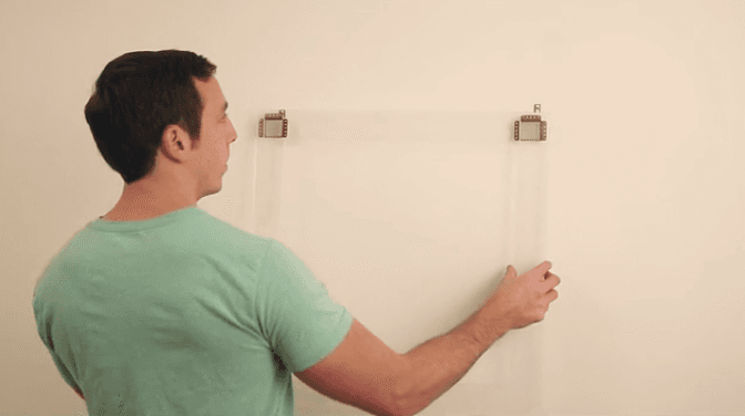 Protect your walls from the Swiss-cheese look with 'Beehive' picture hooks