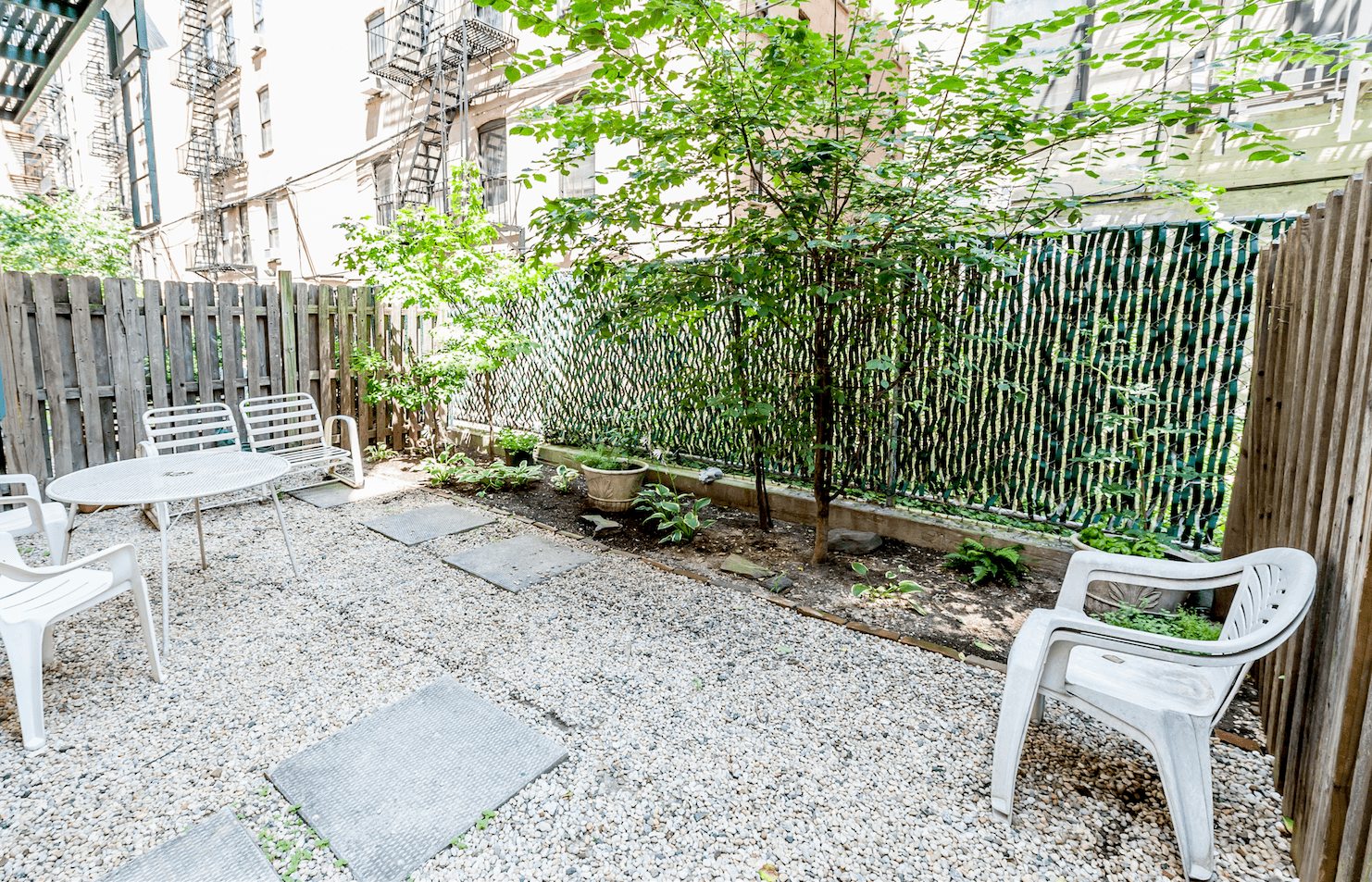 This under-$700K Central Harlem two-bedroom has a large backyard and an "extra" room