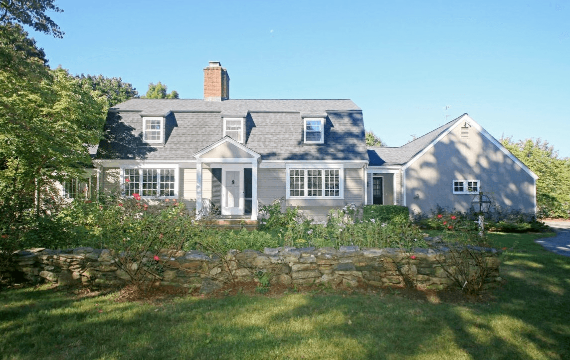 This Greenwich house has a pool, lake, and guest house—and maybe a negotiable price?