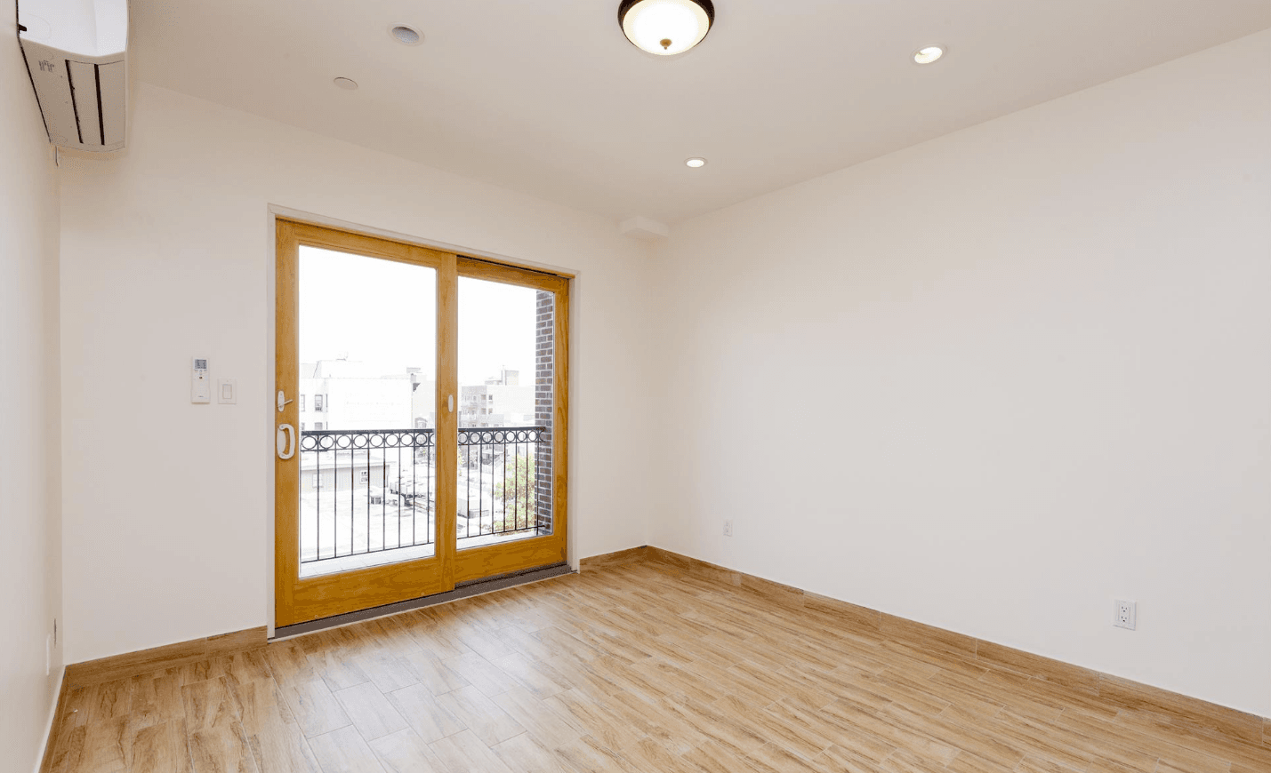 Would you pay $2,395 for a one-bedroom in Astoria? Our experts are at odds over this one