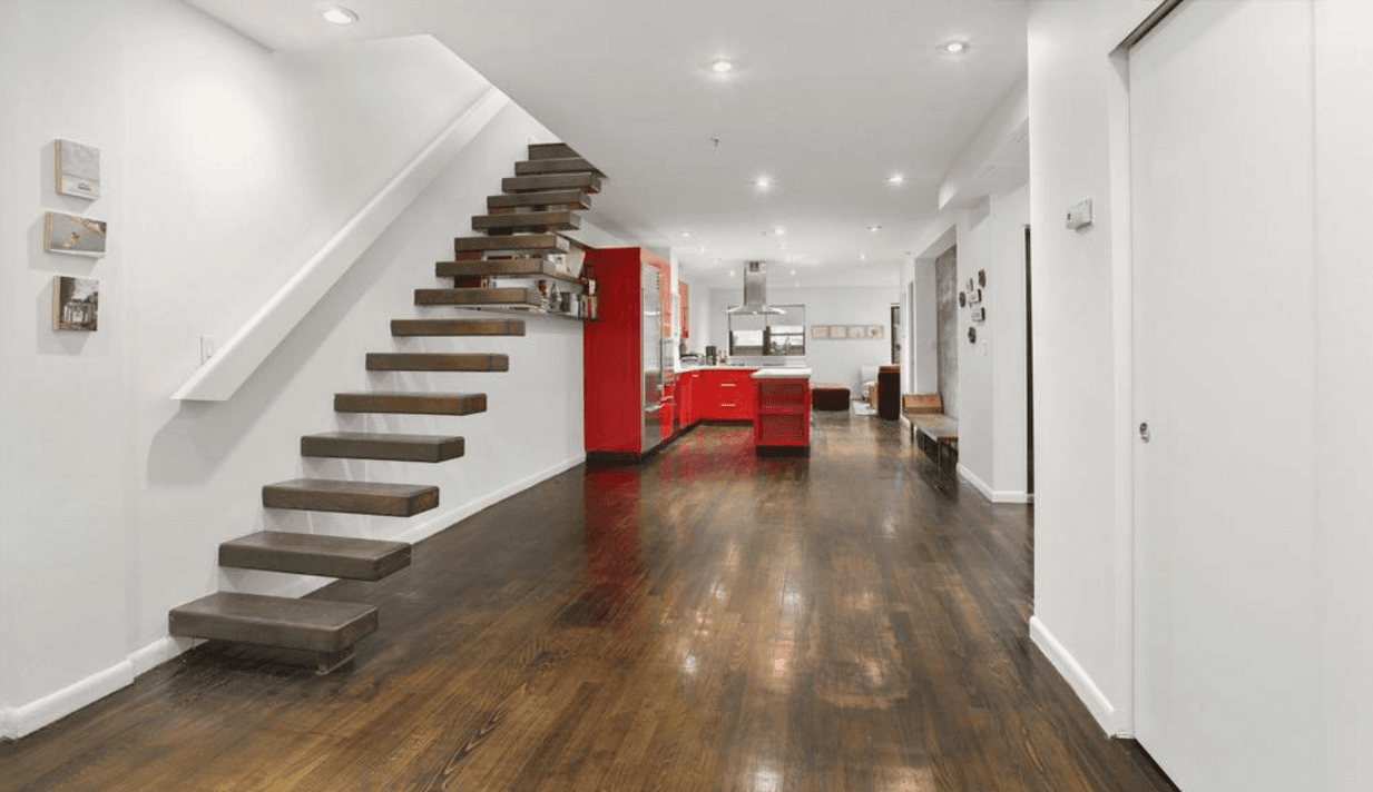 Three terraces and high-tech features make this furnished East Village rental stand out