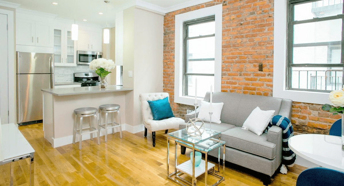 A bright Astoria two-bedroom with modern updates, exposed brick, and condo-like rules